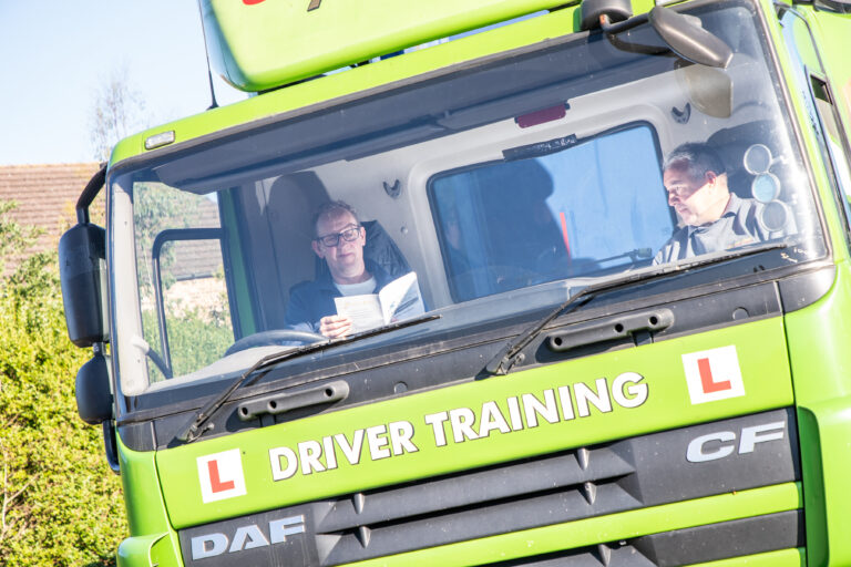 Man learning HGV Driver Training Category C+E in Premier Flee Solutions artic lorry